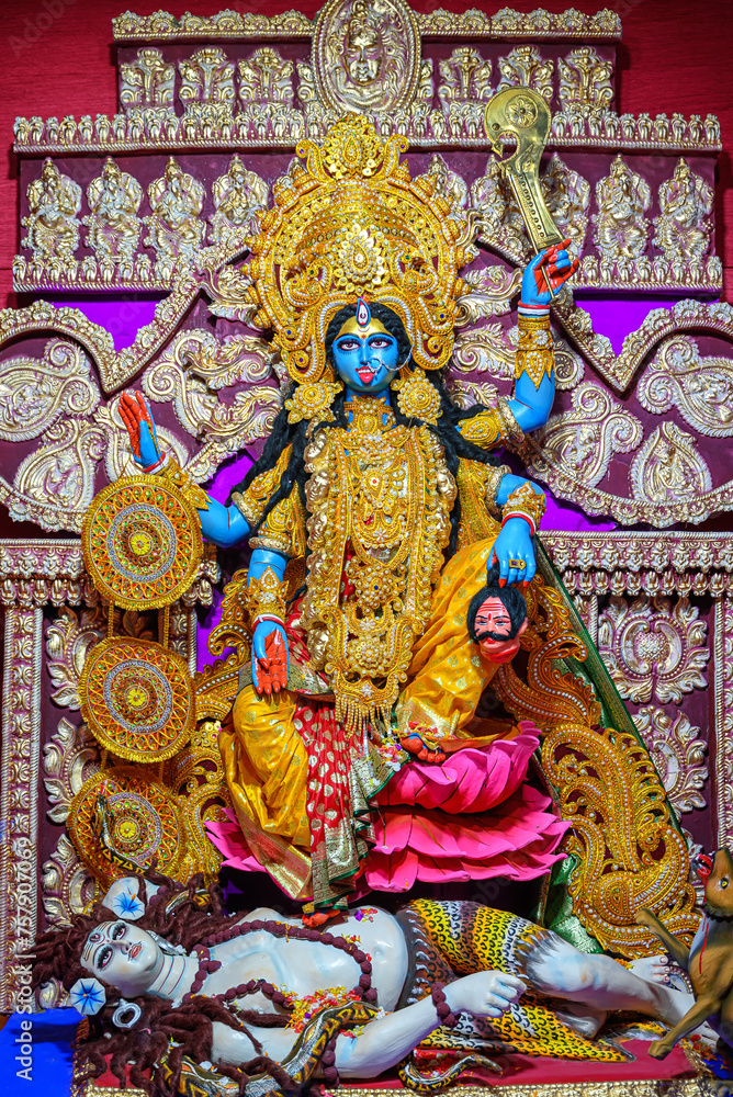 Idol of Goddess Maa Kali at a decorated puja pandal in Kolkata, West