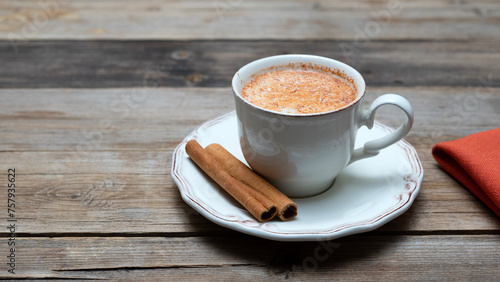 a cup of salep with cinnamon