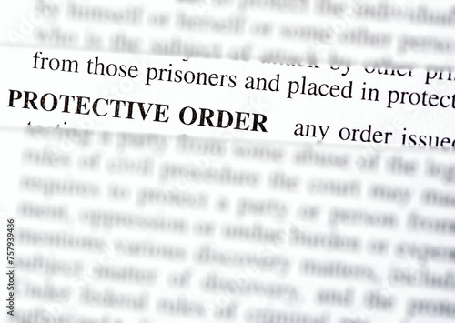 Canvas-taulu close up photo of the words protective order