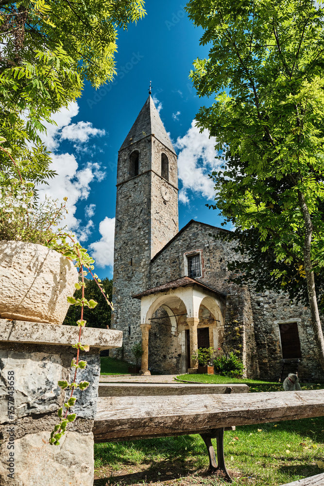 old historic stone church in a small village of the french Alps.