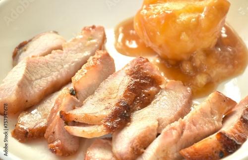 grilled pork neck with mashed potato dressing gravy on plate dipping spicy sauce 
