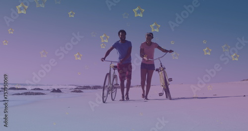 Golden star icons against african american couple with bicycle walking together at the beach