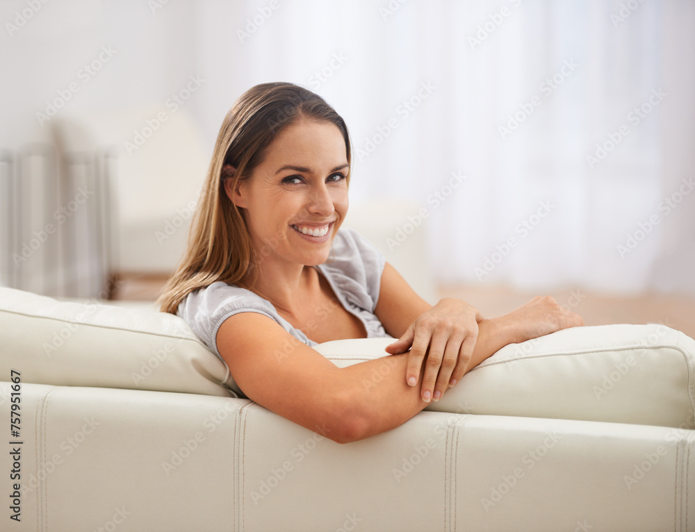 Happy, portrait and face of woman on sofa, couch or calm at home, house or living room in Canada. Female person, lady and teacher resting in apartment, hotel or lounge for weekend, relax or holiday Happy, portrait and face of woman on sofa, couch or calm at home, house or living room in Canada. Female person, lady and teacher resting in apartment, hotel or lounge for weekend, relax or holiday