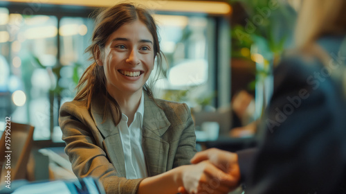 Successful Job Interview Smiling Woman Shaking Hands with Recruiter