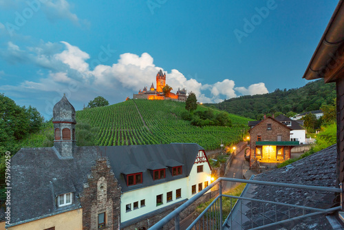 Cochem at sunset, beautiful town on romantic Moselle river, Reichsburg castle on hill, Germany