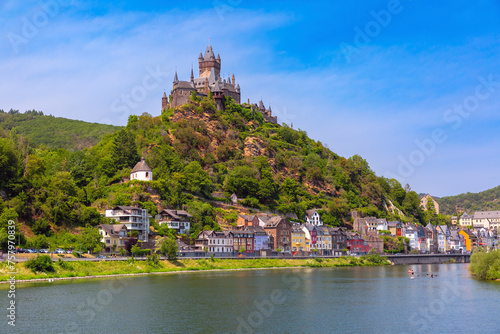 Sunny Cochem, beautiful town on romantic Moselle river, Reichsburg castle on hill, Germany