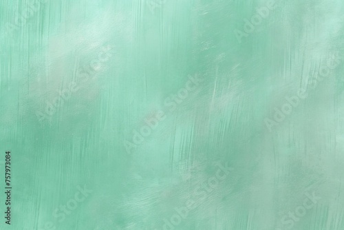 Pastel green brushed metal textured background.