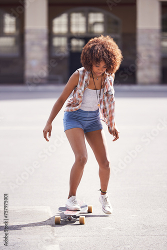 Woman, skateboard and ride at urban skatepark, sports and energy with skill, technique and recreation activity outdoor. Skateboarder, practice and training with workout for balance and exercise