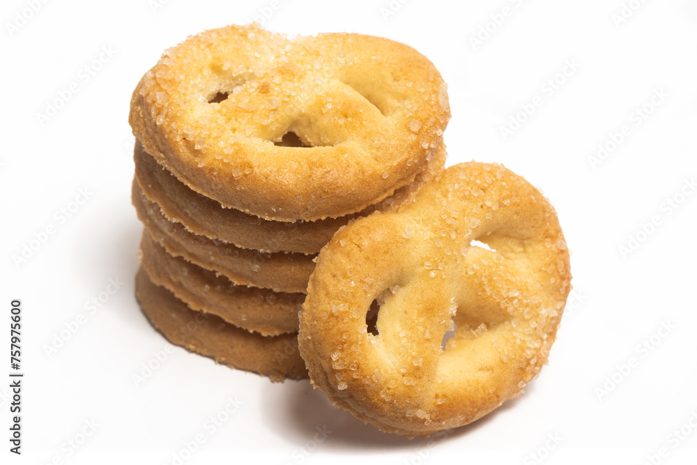 Stacked of danish butter cookies the pretzel cookie isolated on white background clipping path Stacked of danish butter cookies the pretzel cookie isolated on white background clipping path