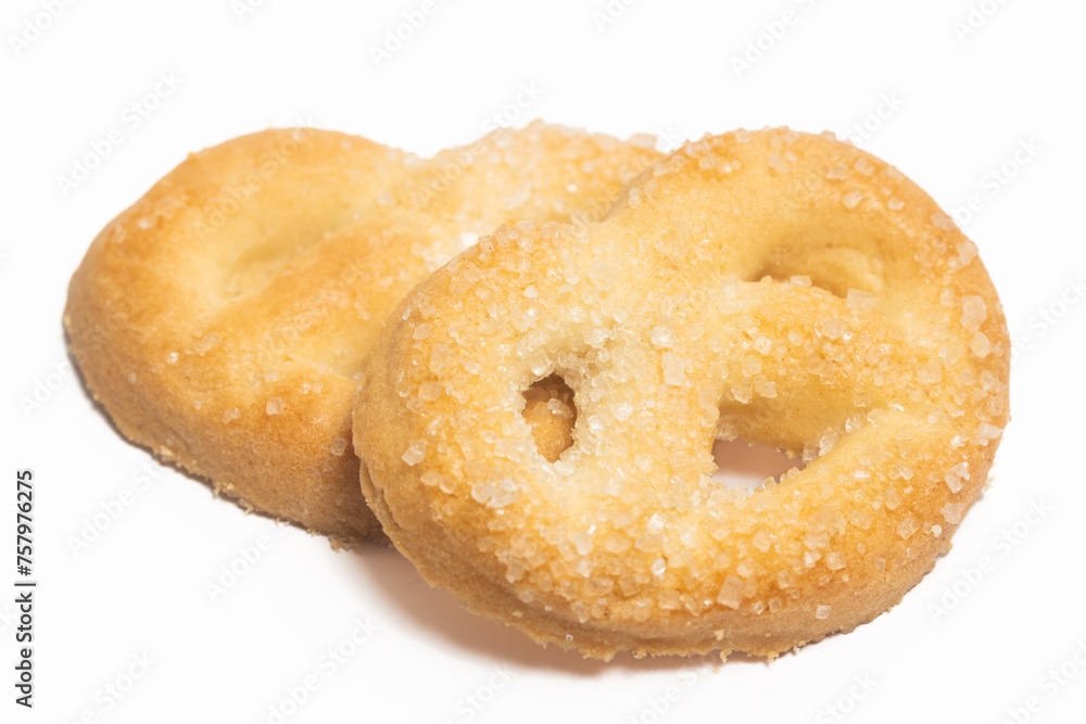 Two danish butter cookies the pretzel cookie isolated on white background clipping path Two danish butter cookies the pretzel cookie isolated on white background clipping path