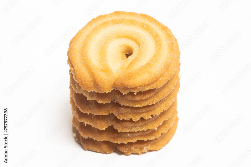 Stacked of danish butter cookies the vanilla ring cookie isolated on white background clipping path Stacked of danish butter cookies the vanilla ring cookie isolated on white background clipping path