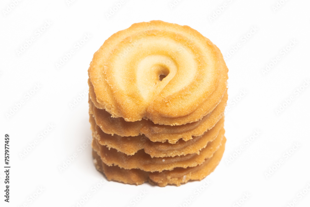 Stacked of danish butter cookies the vanilla ring cookie isolated on white background clipping path Stacked of danish butter cookies the vanilla ring cookie isolated on white background clipping path