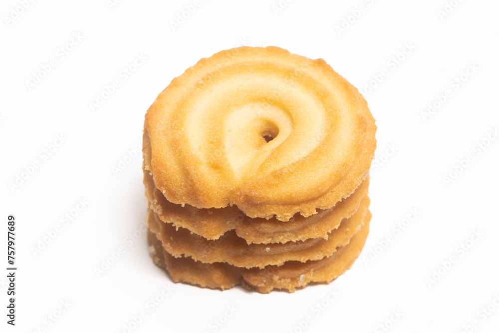 Stacked of danish butter cookies the vanilla ring cookie isolated on white background clipping path Stacked of danish butter cookies the vanilla ring cookie isolated on white background clipping path
