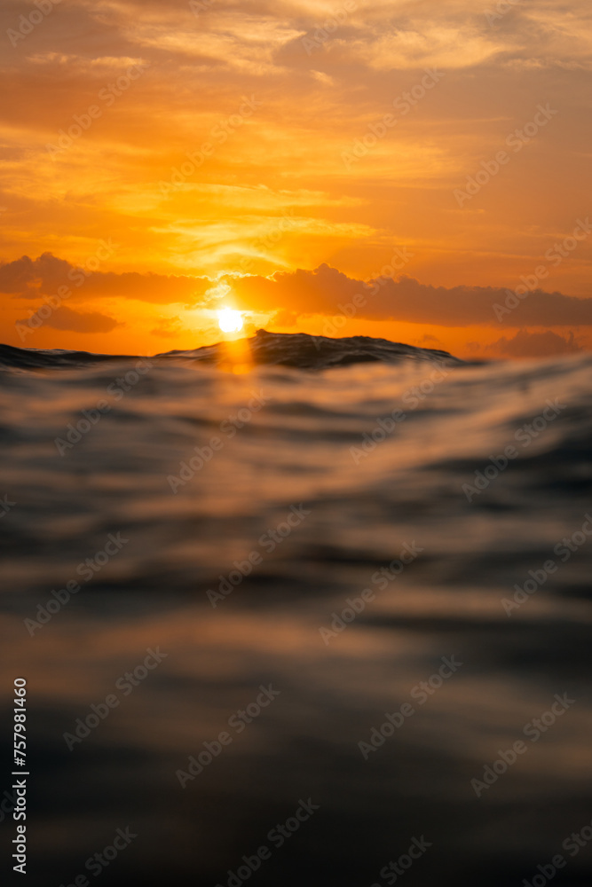 Scenic sunrise view from the ocean surface.