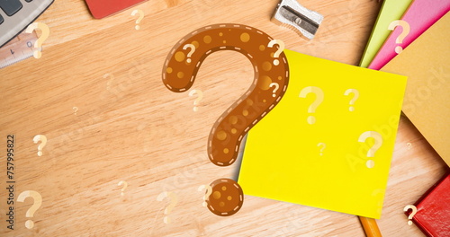 Image of question marks over school items