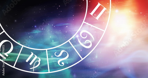 Image of gemini star sign symbol in spinning horoscope wheel over glowing stars