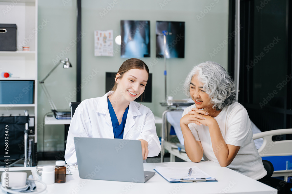 Portrait of female doctor explaining diagnosis to her patient. Doctor Meeting With Patient In Exam Room. A medical practitioner reassuring a patient . Portrait of female doctor explaining diagnosis to her patient. Doctor Meeting With Patient In Exam Room. A medical practitioner reassuring a patient .