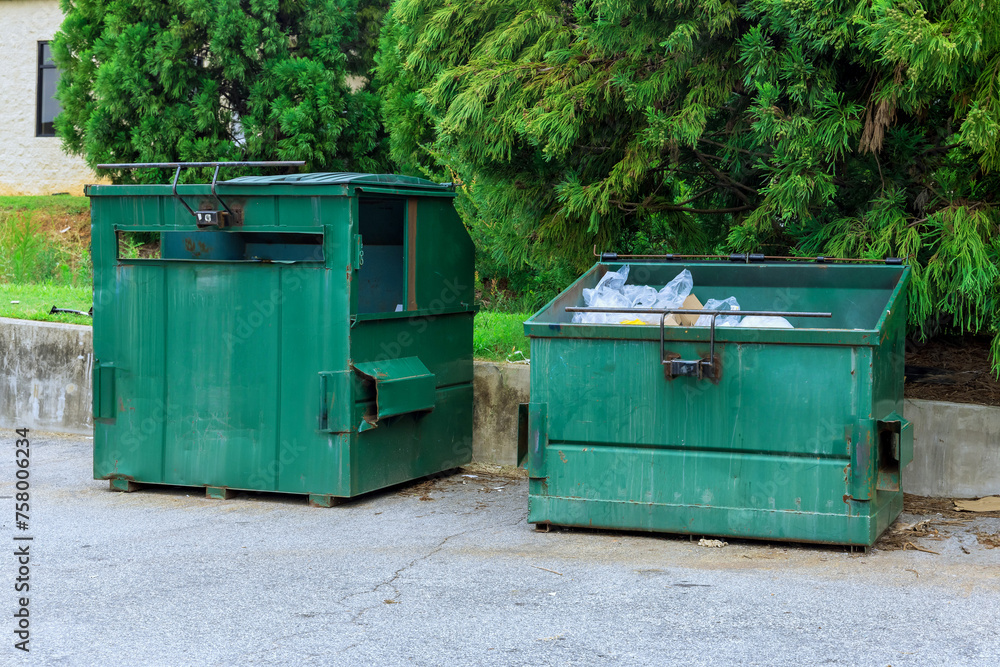 Metal containers used during house for storing household waste Metal containers used during house for storing household waste