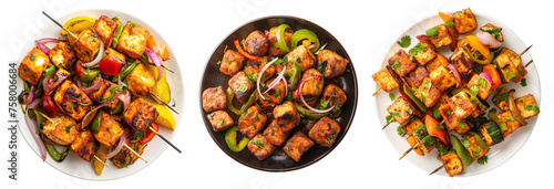 Set of Paneer Tikka at skewers in a plate, isolated top view on transparent background. Paneer tikka is an indian cuisine dish with grilled paneer cheese with vegetables and spices.