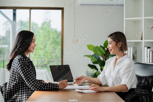 real estate agent or home developer present contract for the sale of home to advisor