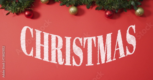 Image of present tag with christmas greetings on red background