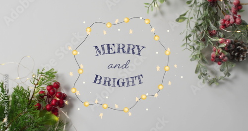 Image of merry and bright text over christmas decorations