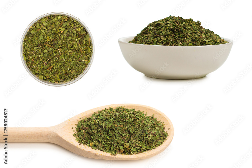 Dried green mint in a bowl isolated on white background. Dried green mint in a bowl isolated on white background.