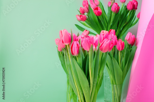 Fototapeta Naklejka Na Ścianę i Meble -  Bright spring festive background with pink tulips and a copy of the space. Bouquet of flowers.