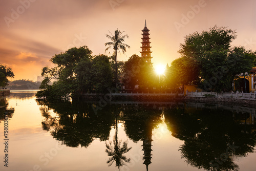 Traditional buddist pagoda on sunset in Hanoi city, Vietnam © Maresol