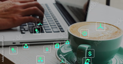 Image of icons, close up of coffee cup, cropped hands of caucasian man working on laptop