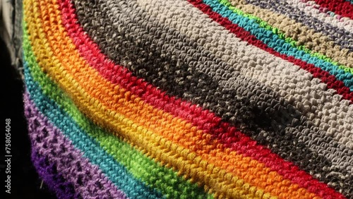 fragment of a multi-colored handmade rug