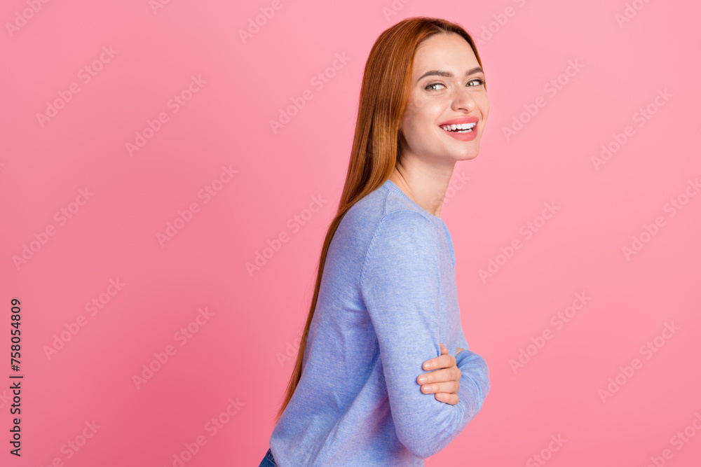 Photo of optimistic girlish woman dressed blue shirt look at promo empty space hold arms crossed isolated on pink color background Photo of optimistic girlish woman dressed blue shirt look at promo empty space hold arms crossed isolated on pink color background