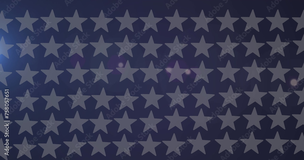 Naklejka premium Image of rows of american flag stars spinning on blue background