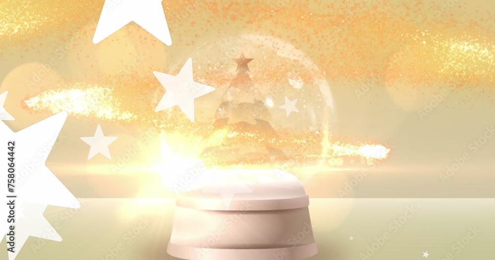 Fototapeta premium Image of light spots and stars over snow globe with christmas tree