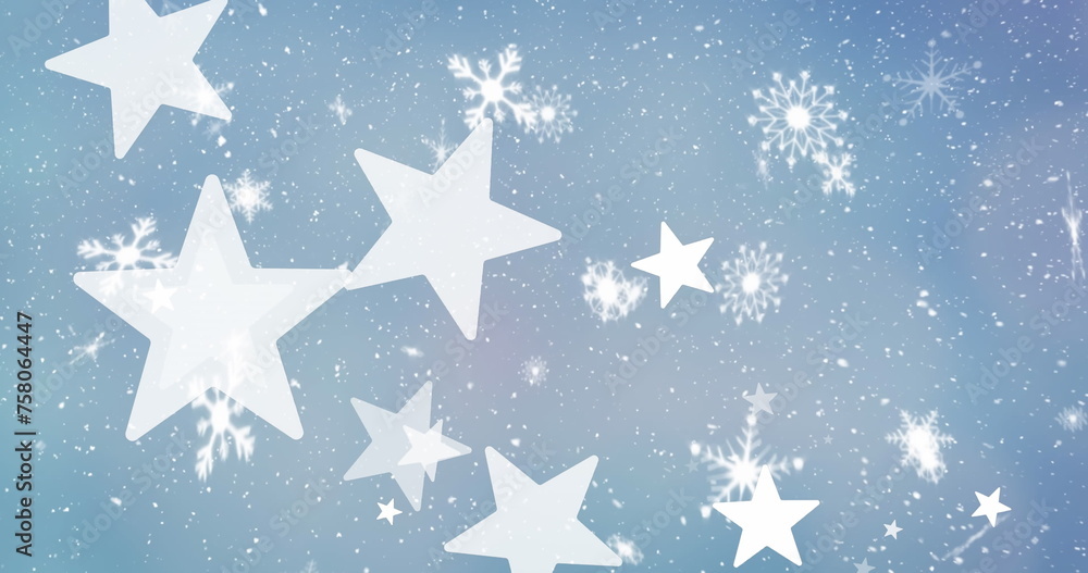 Fototapeta premium Image of snow and stars over blue background