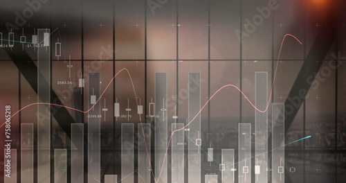 Image of financial graphs moving over cityscape