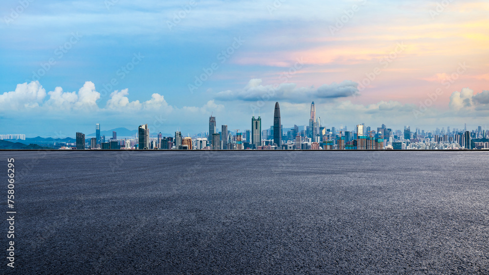 Asphalt road square and city skyline with modern buildings at dusk in Shenzhen