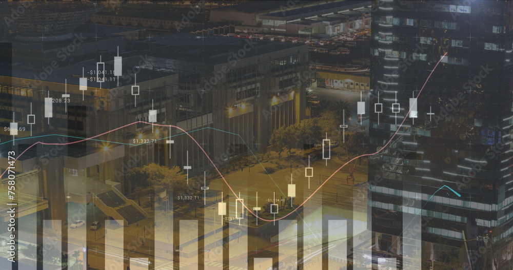 Digital image of graphs moving in the screen while background shows a view of the city in the evenin