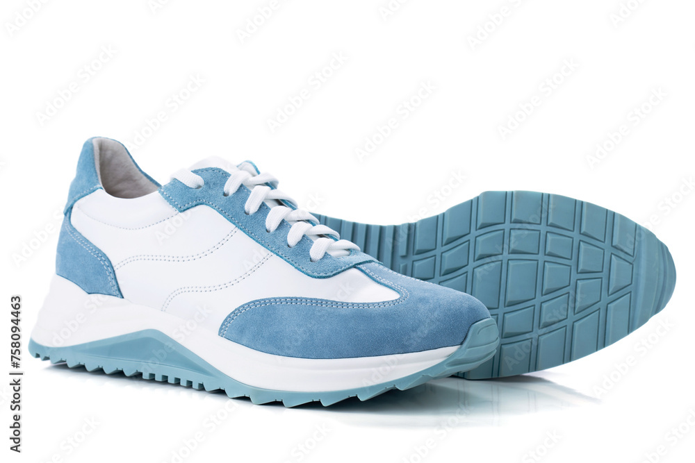 Pair of blue sneakers isolated on white