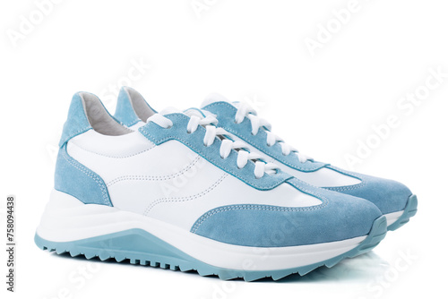 Pair of blue sneakers isolated on white