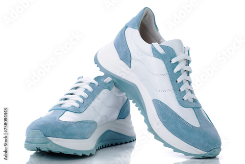 Pair of blue sneakers isolated on white