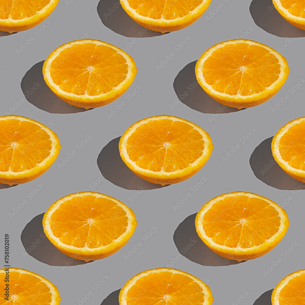 Seamless pattern of lemon or orange slices with shadow on a gray background. Flat layout Seamless pattern of lemon or orange slices with shadow on a gray background. Flat layout
