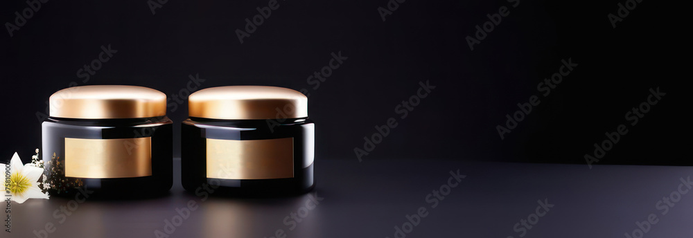 Banner black jars without inscriptions for skin care on a black background with flowers in backlight with space for text Banner black jars without inscriptions for skin care on a black background with flowers in backlight with space for text