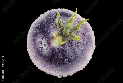 Genetically Modified Purple Tomato with Water Drops on Black Background