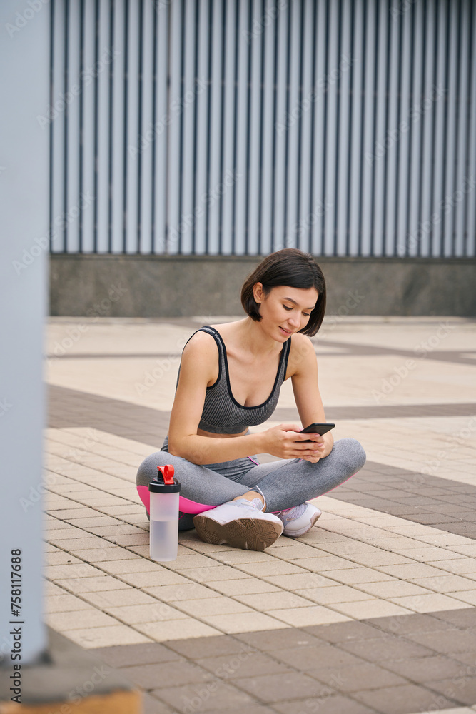 Fototapeta premium Woman on morning activity, rest, tired after training