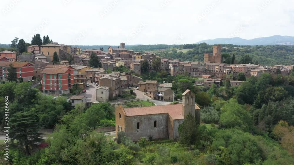 Beautiful drone view of medieval town of Proceno in the north of Lazio region, in central Italy, in a nice spring day with clear sky and surrounded by lovely hills. Beautiful drone view of medieval town of Proceno in the north of Lazio region, in central Italy, in a nice spring day with clear sky and surrounded by lovely hills.