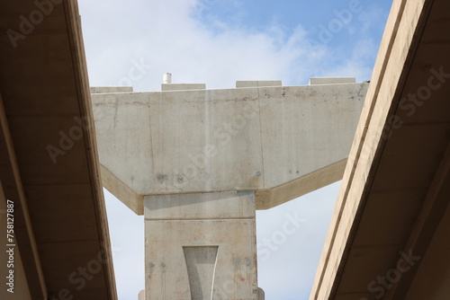 A piling rises above and between two  roadways of the Dallas High 5 interchange. Original section opened December 2005 and has undergone constant additions to both the west and now the east corridor photo
