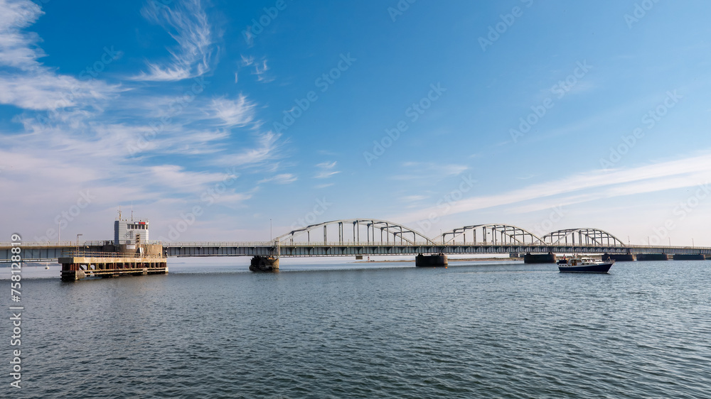 Oddesund Bridge linking Jutland mainland and Thyholm over Oddesund Strait in Limfjord, Midtjylland, Denmark Oddesund Bridge linking Jutland mainland and Thyholm over Oddesund Strait in Limfjord, Midtjylland, Denmark