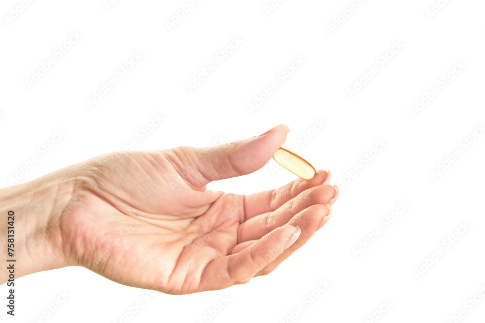 Female hand holding Omega 3 capsule isolated on white background. Close up. High resolution product. Female hand holding Omega 3 capsule isolated on white background. Close up. High resolution product.