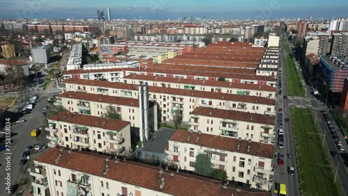 Italy, Milan 03-14-2024 Aler public housing blocks to be demolished in the suburban neighborhood of Giambellino Lorenteggio - Drone view of occupied poor homes - urban redevelopment of the suburbs photo